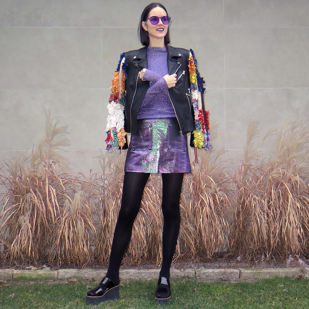 Joelle Litt wears a custom Namesake leather jacket, Carven top, Opening Ceremony skirt and Shop Shade Sunglasses.
